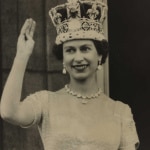 The Queen waves from the palace balcony after the Coronation, 1953.