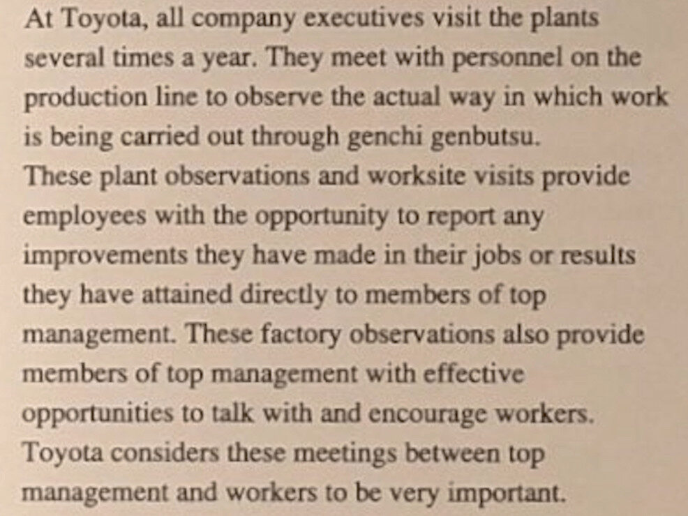 Excerpt from Toyota TQM guidebook describing genchi genbutsu, executive plant visits, and direct engagement between leaders and frontline workers