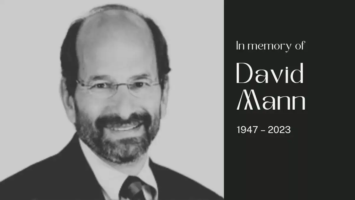 Honoring and Remembering David Mann, Author of ‘Creating a Lean Culture’ A black and white memorial image of David Mann. The left side features a photo of David Mann, smiling and wearing glasses and a suit. The right side has a black background with white text that reads: "In memory of David Mann 1947 – 2023."