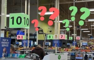 Visual Management Gone Wrong: A Christmas Lesson from the Grocery Store Photo of a grocery store with checkout register signs that are lit of red or green