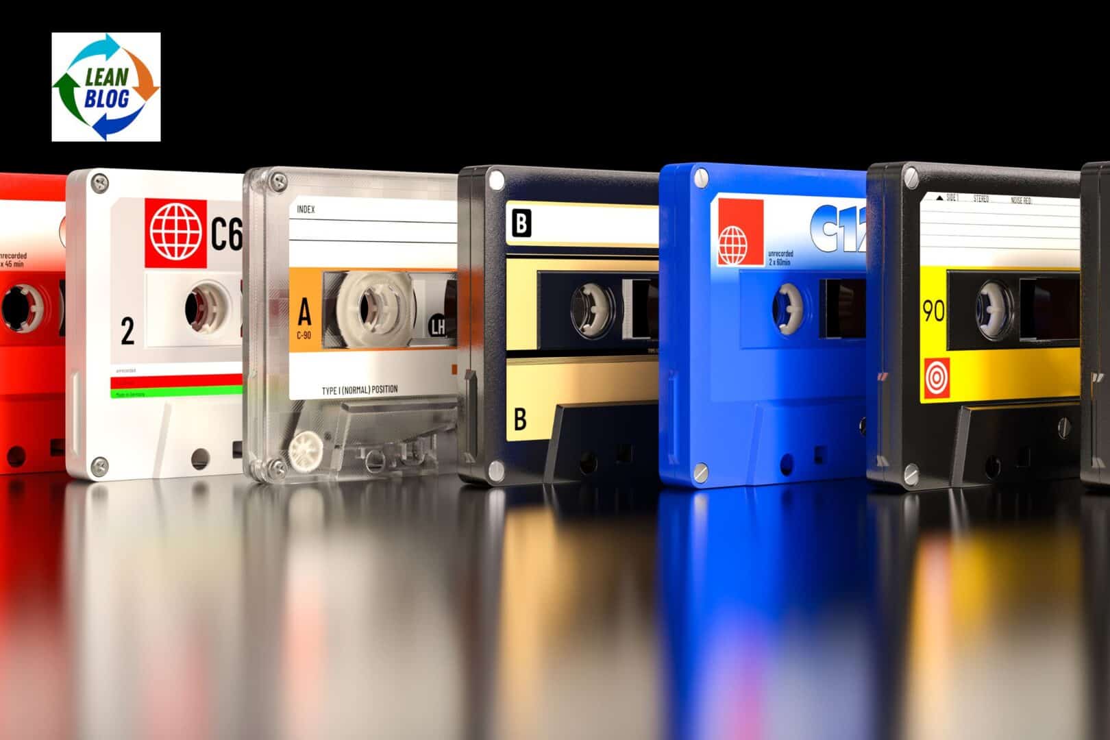 Colorful audio cassette tapes aligned in a row, representing data storage or media formats.