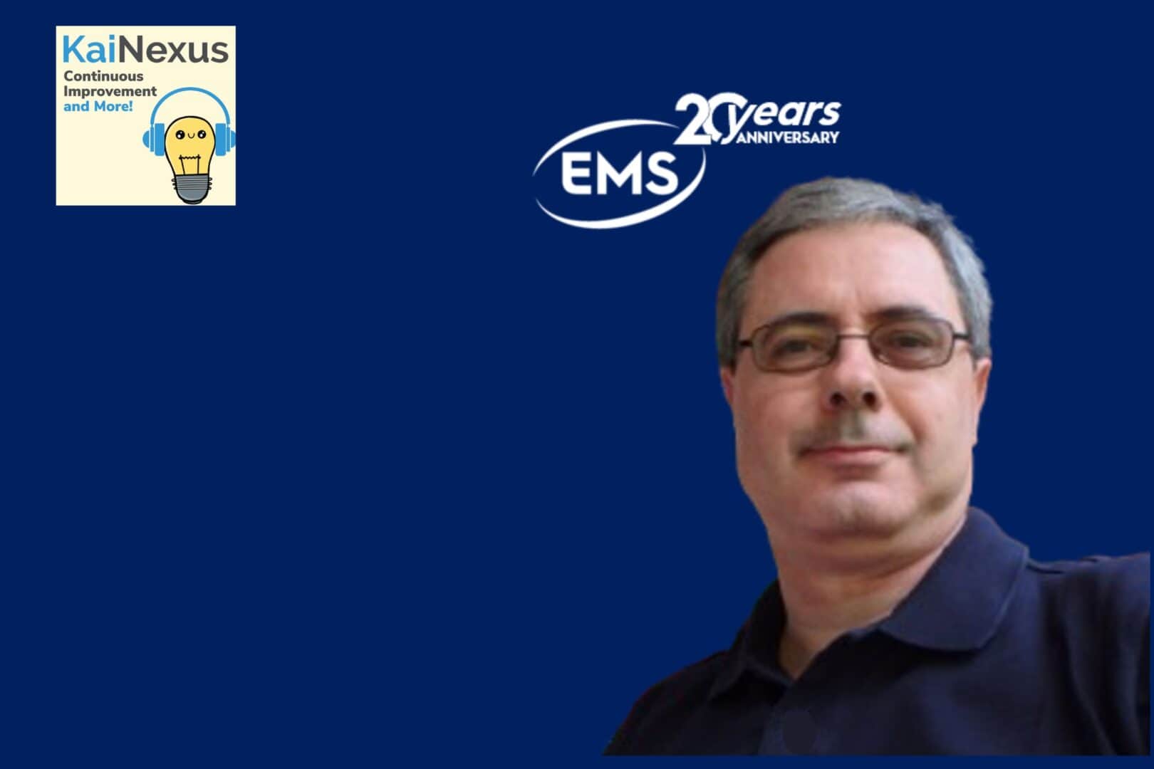 1. Professor with glasses in front of EMS 20th anniversary logo and KaiNexus logo on blue background.