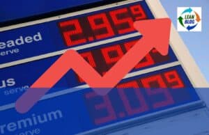 Gas Prices and Bad Metrics: Why Snapshot Comparisons Mislead Us Fuel price sign with a red upward arrow overlay, indicating rising fuel costs.