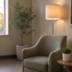 Empty hospital wellness room with armchair, succulent, and noise machine — designed but unused