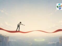 Even in Japan: A Target of Zero and a Process That Lives Near Seven Percent Manga- and anime-influenced editorial illustration in a wide horizontal format. A small lone figure, seen from behind in plain clothes, stands on a glowing crimson ribbon that stretches horizontally across the frame like a floating path. The ribbon gently rises and falls but stays level. The person leans forward with one arm extended, reaching toward a soft sage-green glowing ring far below and ahead across a wide empty gap. Pale cliffs frame the distant lower edges, while most of the image is filled with a vast cream-to-blue sky with thin clouds and ample negative space. The mood is quiet, reflective, and slightly wistful.